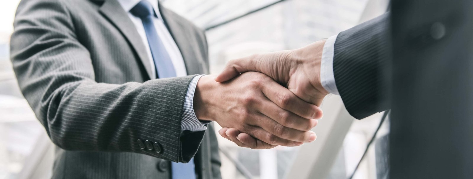 lawyers handshake with a client